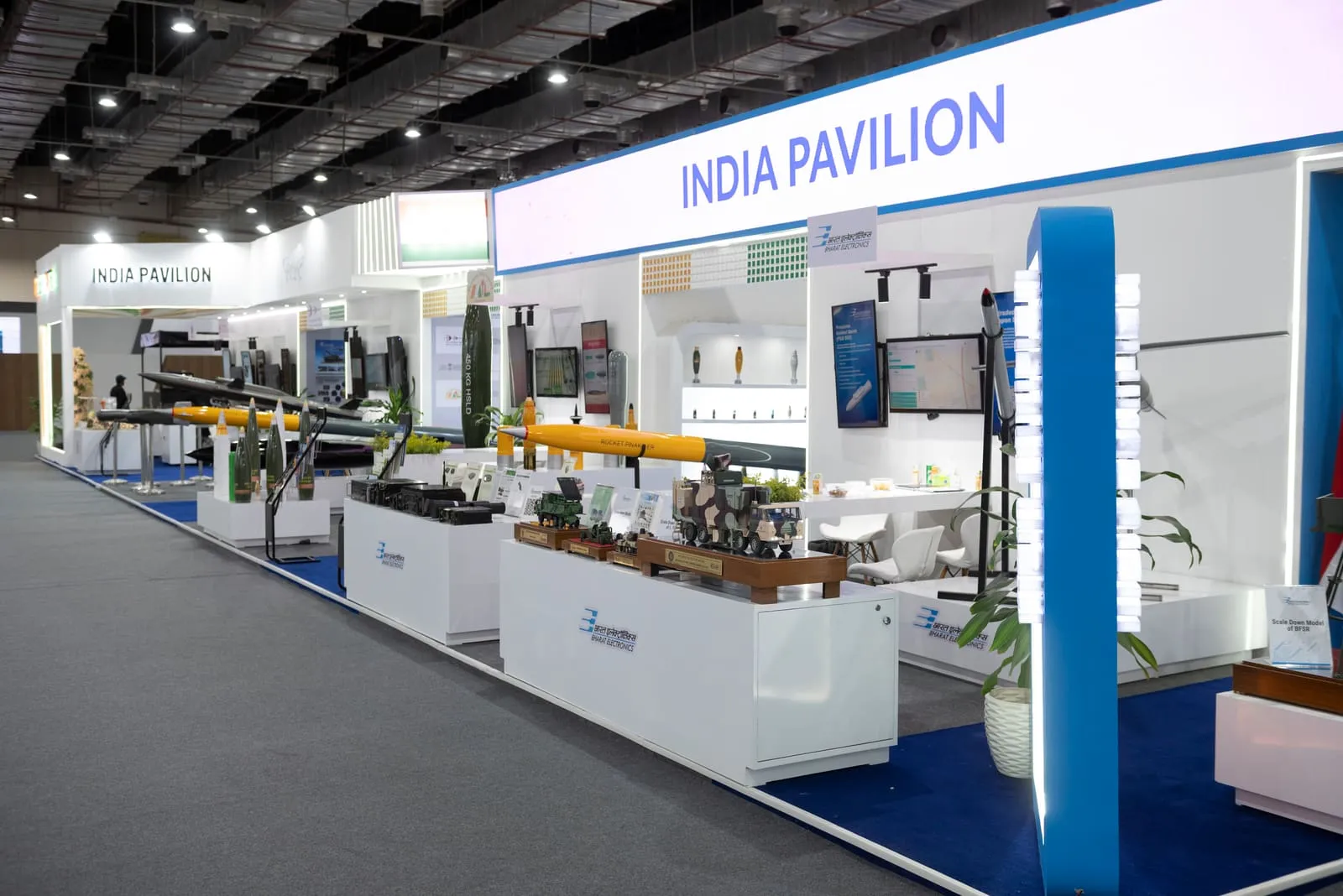 India national pavilion with a long branded fascia at a defence exhibition