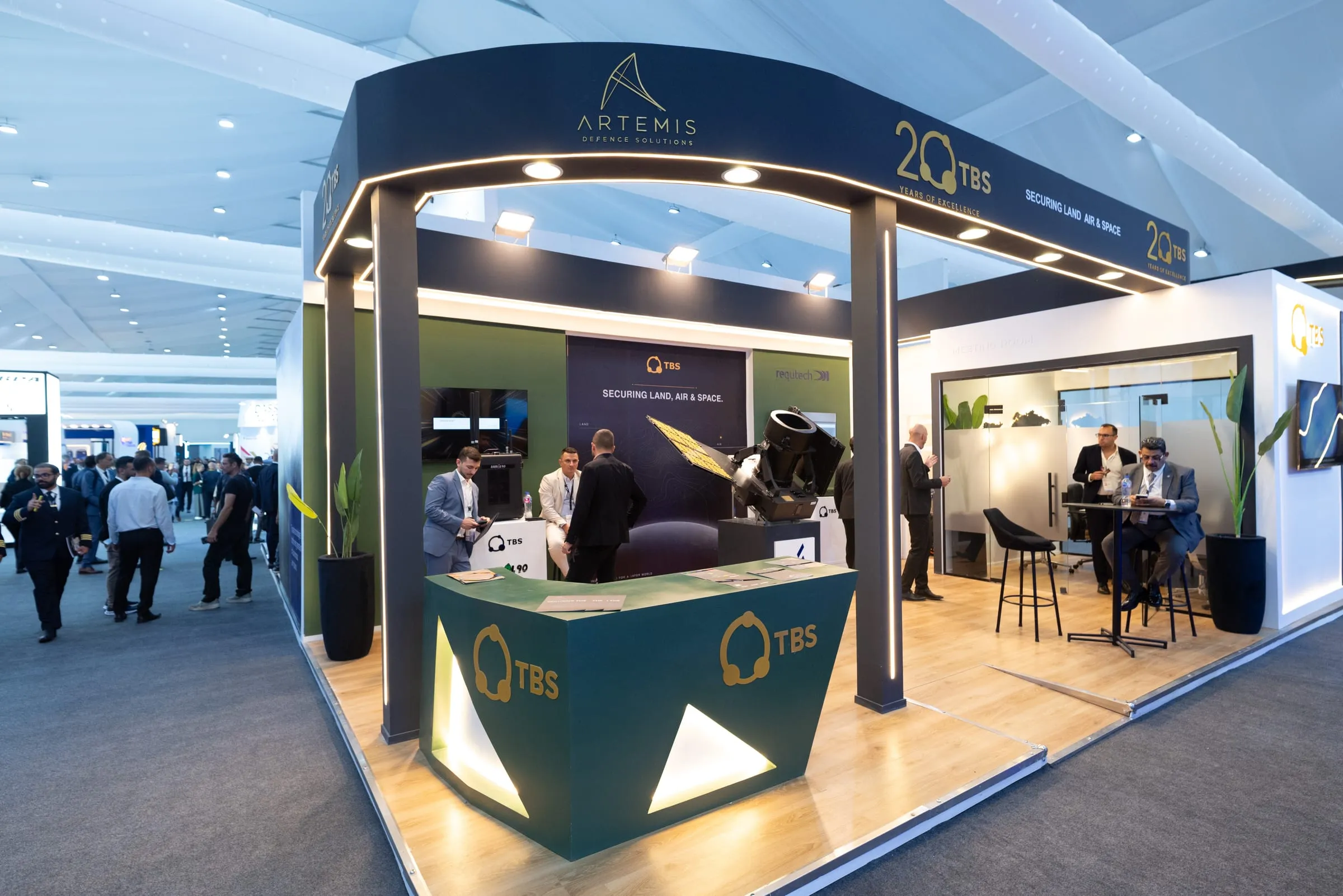 Business meeting on an exhibitor stand at El Alamein International Airshow 2026